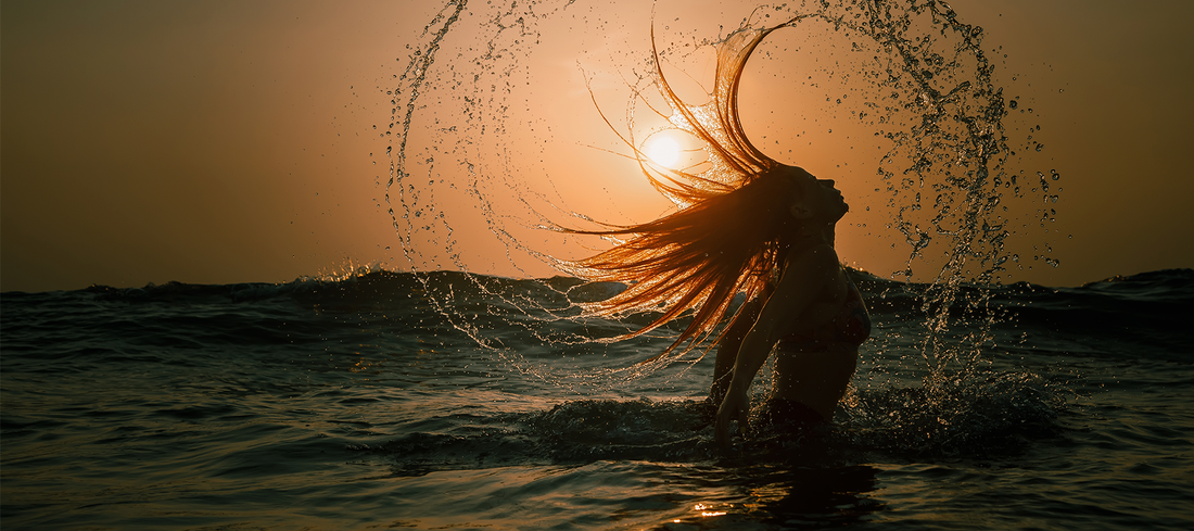 Why your hair feels different after a holiday & what to do about it