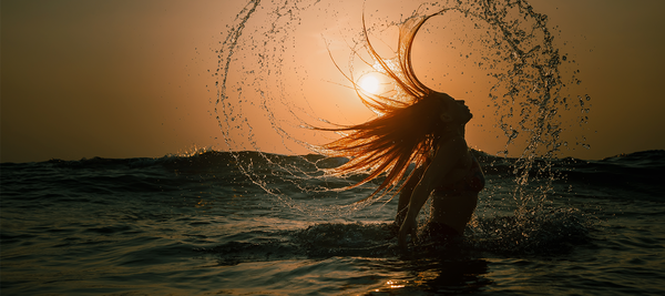 Why your hair feels different after a holiday & what to do about it