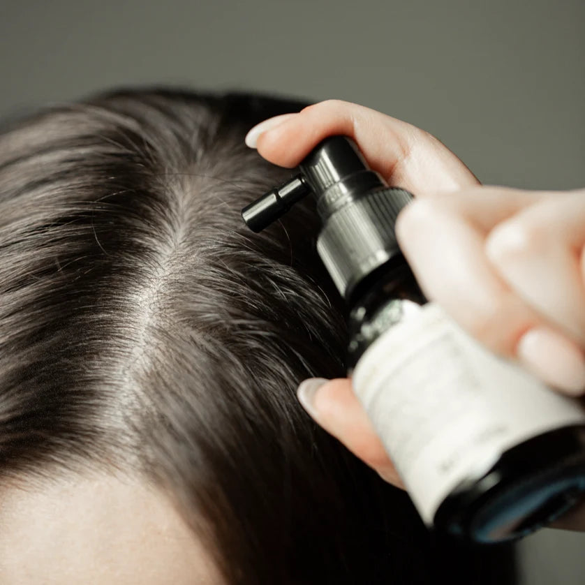 Oway Dandruff Remedy – Oily Scalp applied directly along the scalp