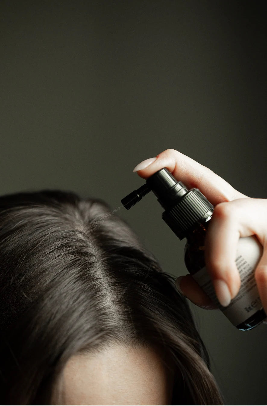 Oway dry-dandruff treatment applied directly along the scalp