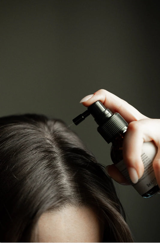 Oway dry-dandruff treatment applied directly along the scalp