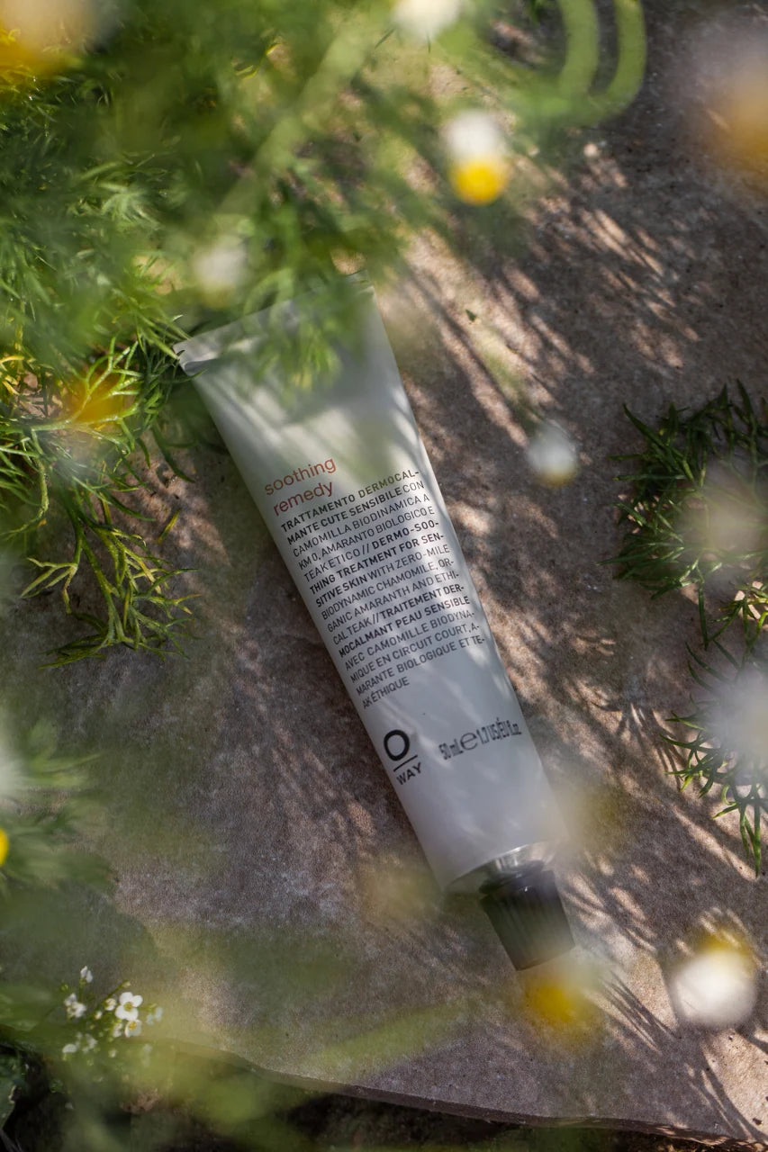 Oway Soothing Remedy photographed outdoors among green foliage