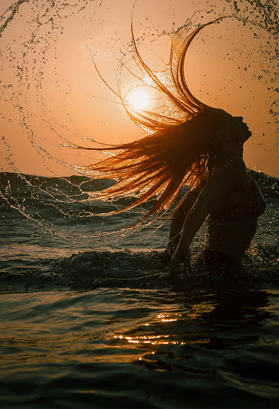 Why your hair feels different after a holiday & what to do about it