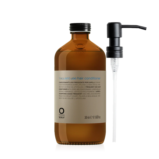 Oway Frequent Use Conditioner 240ml amber glass bottle with a black screw cap with metal pump dispenser
