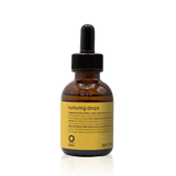 Oway Nurturing Drops 50ml in an amber glass bottle with a yellow label and black dropper